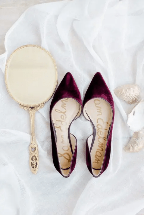 Gorgeous plum colored velvet flats to make a statement with color at a fall or winter wedding
