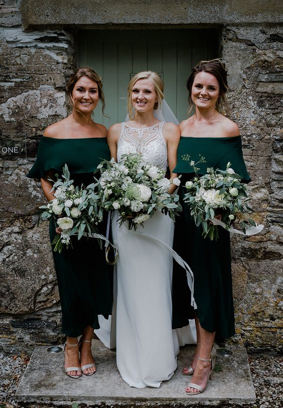 hunter green off the shoulder midi bridesmaid dresses and silver shoes plus green and white wedding bouquets