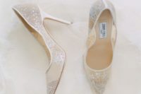 nude and white lace wedding shoes by Jimmy Choo are refined classics for a chic bridal look