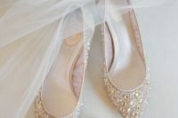 nude wedding shoes with heavy embellishments are super shiny and super bold and will add glam to your look