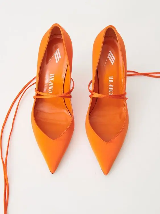 orange pointed toe cutout pumps with laces are gorgeous to add a touch of color to a summer or fall bridal look