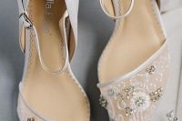 stylish and chic white wedding shoes with lace embellished tops and ankle straps are amazing for a classic bridal look