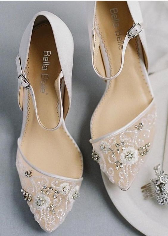stylish and chic white wedding shoes with lace embellished tops and ankle straps are amazing for a classic bridal look