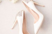 white wedding shoes with heavily embellished backs and heeels by Badgley Mischka are amazing for weddings