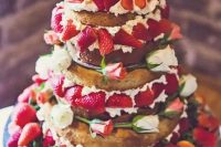 08 a jaw-dropping naked wedding cake with whipped cream, garden roses and lots of strawberries is a fantastic idea for a summer wedding