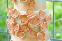 101 a whimsical mint wedding cake with orange sugar blooms and orange ribbons is a lovely idea for a bright summer wedding