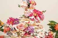 128 a beautiful waffle wedding cake with strawberries, pink and purple blooms and sugar powder is a lovely idea for a summer wedding
