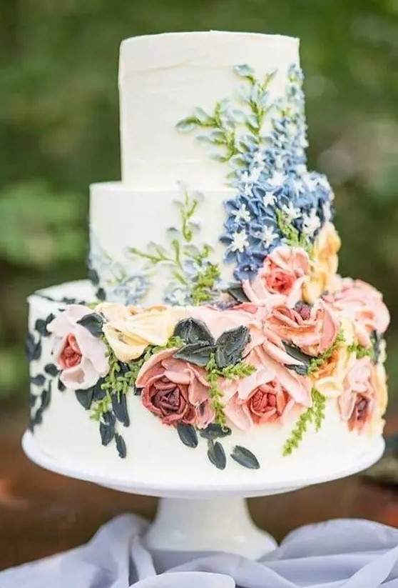 a bright floral textural wedding cake is a bold and fun idea for a spring or summer wedding, all the blooms are made of sugar