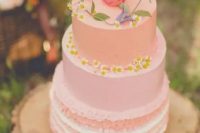 56 a delicate pink summer wedding cake with some wildflowers on top is a fantastic boho or wildflower wedding idea