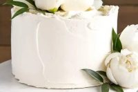 86 a small textural white wedding cake topped with white peonies for a chic look is a great idea for an all-white wedding
