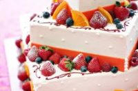 88 a square wedding cake with bold orange ribbons and bright berries and fruit is a gorgeous idea for a bold summer wedding