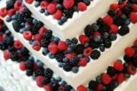 89 a square white buttercream wedding cake fully topped with fresh berries is a lovely idea for a summer wedding, berries always scream summer