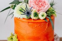 95 a textural orange wedding cake with fresh blooms, thistles and greenery is a lovely and bold idea for summer