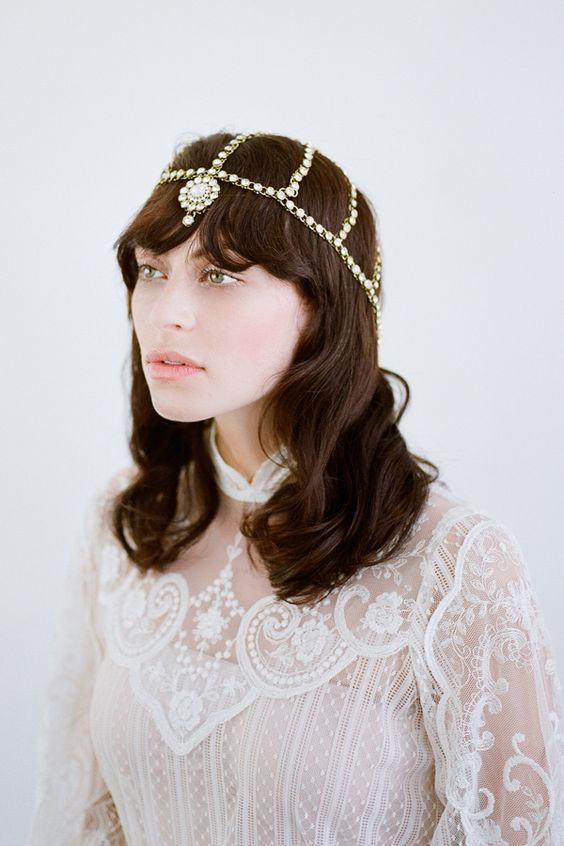 a Moroccan boho chic headpiece with crystals and a large pendant for a creative and cool look