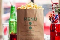 a menu printed out on a paper bag with popcorn is great for a non-formal wedding