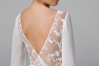 a modern plain A-line wedding dress with chic sleeves, a beautiful cutotu back with lace covering it partly is amazing