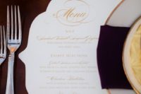 an elegant and chic cutout wedding menu placemat is a refined idea for a super stylish wedding with a formal feel