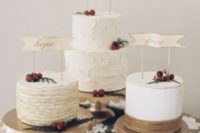 gold scallop edge wedding cake stands, nuts and cinnamon sticks make this wedding cake table elegant
