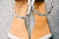 heavily embellished ankle strap wedding sandals are nice for adding a shiny touch to the look