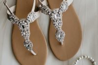 heavily embellished wedding sandals are a bold and chic idea to add a touch of bling to your look