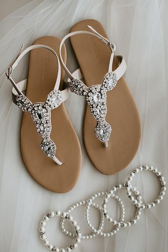 heavily embellished wedding sandals are a bold and chic idea to add a touch of bling to your look