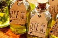 olive oil in bottles with tags is a great summer wedding favor for an Italian wedding