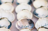 shell wedding escort cards are a gorgeous beach-screaming idea for a modern beach wedding