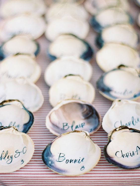 shell wedding escort cards are a gorgeous beach screaming idea for a modern beach wedding