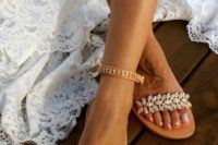tan leather ankle strap heavily embellished wedding sandals are a nice and bold idea for a beach bride