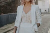 a cute bridal look in a white pantsuit