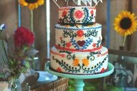 a colorful Mexican-inspired wedding cake