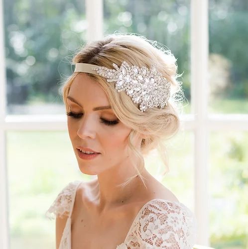 a heavily embellished wedding headband is a gorgeous idea for an art deco bridal look