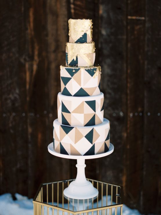 a white, gold, blush and black triangle wedding cake with gold dip is a chic and lovely idea for a modern and bold wedding