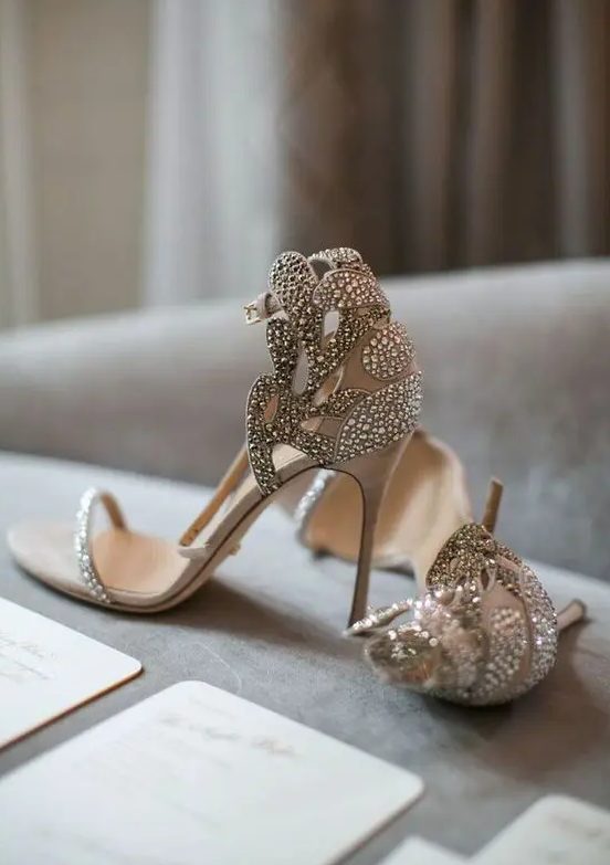beautiful neutral embellished and laser cut bridal heels with just one strap on the top are amazing for a spring or summer bride