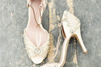 chic gold embellished wedding shoes with metallic straps and peep toes look very shiny and very glam