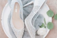 delicate pale blue semi sheer wedding shoes with sequins here and there are a chic and lovely idea for a spring or summer bride