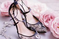 exquisite semi sheer black shoes with beautiful rhinestone and pearl embroidery plsu laces are amazing for a refined bride