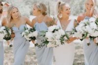 mismatching powder blue bridesmaid maxi dresses are a sweet and cute idea for spring and summer weddings