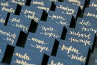 navy and gold escort cards will match your wedding decor