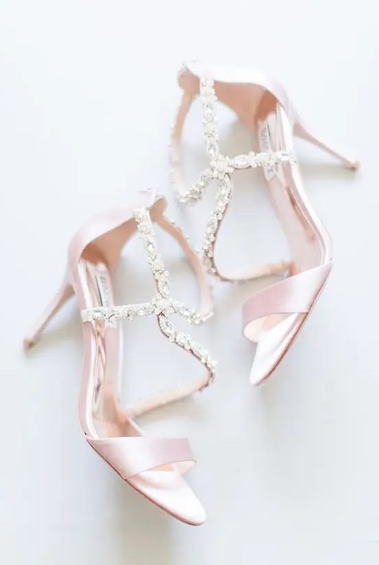 pink strappy wedding shoes with beautiful embellishments for a delicate yet shiny look and a subtle touch of color