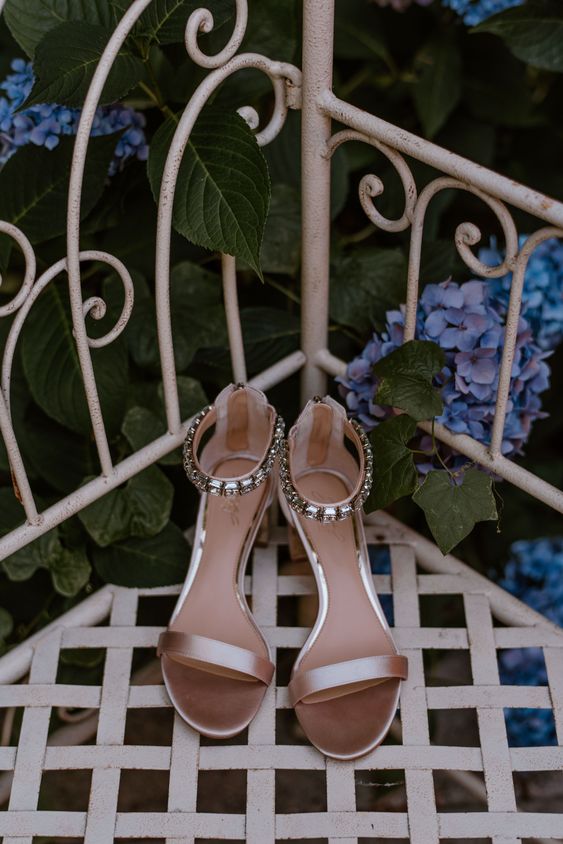 shiny white and copper wedding shoes with embellished ankle straps are amazing for a spring or summer bride