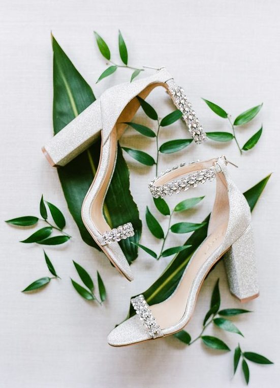 shiny white wedding shoes with embellished tops and ankle straps are amazing for a glam bride