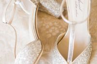 silver glitter T strap wedding shoes with a vintage design are amazing for a vintage-inspired and super elegant bridal look