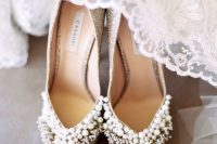 silver glitter and heavily embellished wedding shoes with rhinestones and pearls are a gorgeous solution to rock for a super glam touch