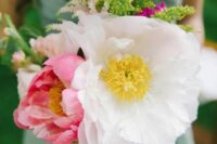 a beautiful wedding bouquet of oversized pink and white blooms and greenery is a lovely idea for spring and summer