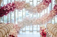 a wedding ceremony space with ombre garlands
