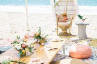 a bright beach bridal shower setting with colorful pillows and ottomans, with bright blooms and citrus in a plate