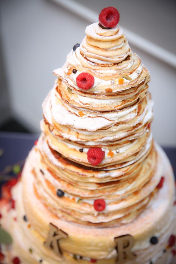 a cepe wedding cake with cream cheese and fresh berries is a gorgeous idea for a laid-back summer or fall wedding