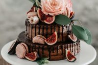 a lovely fall wedding cake with chocolate drips