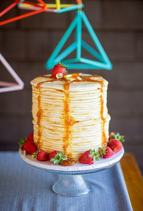a pancake wedding cake with caramel and strawberries is a lovely idea for a bright summer wedding
